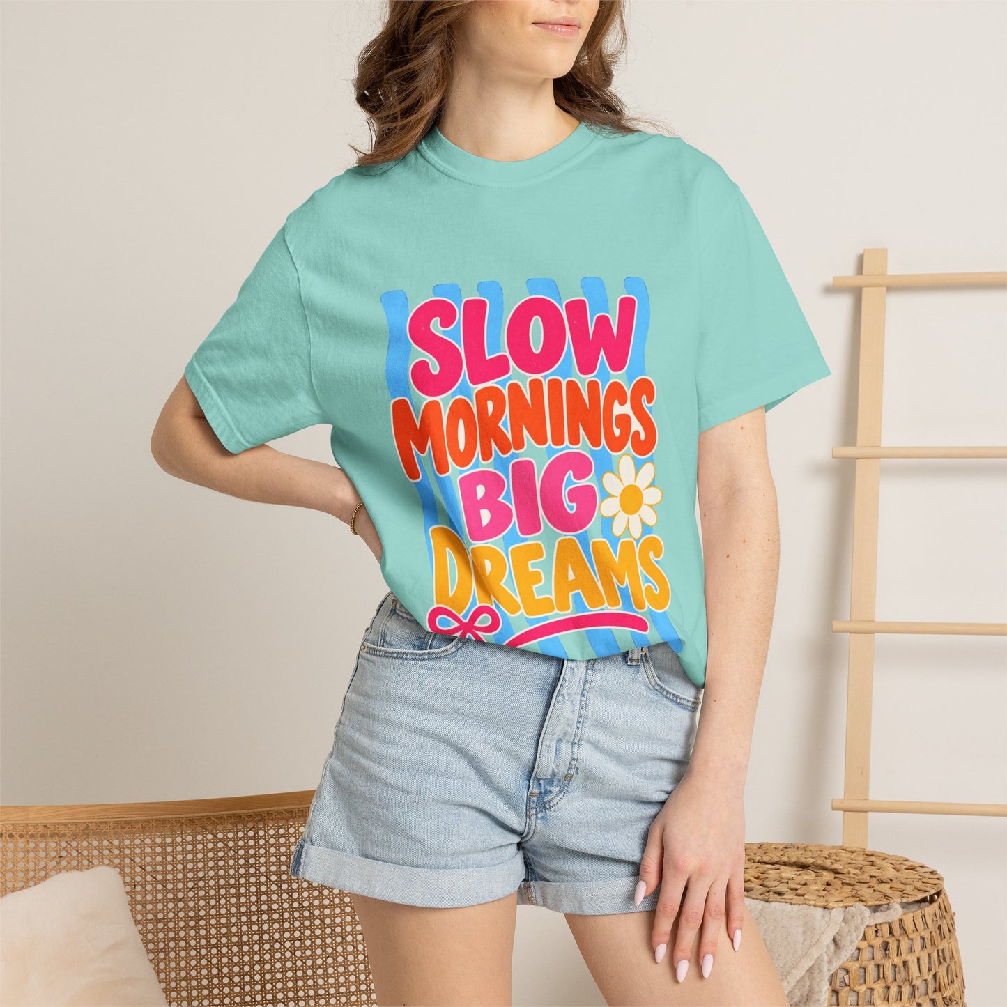 Slow Mornings, Big Dreams Tee in Chalky Mint, front view - a large centered full-front print in bold lettering over a wavy stripe backing, on a garment-dyed Comfort Colors 1717 tee.