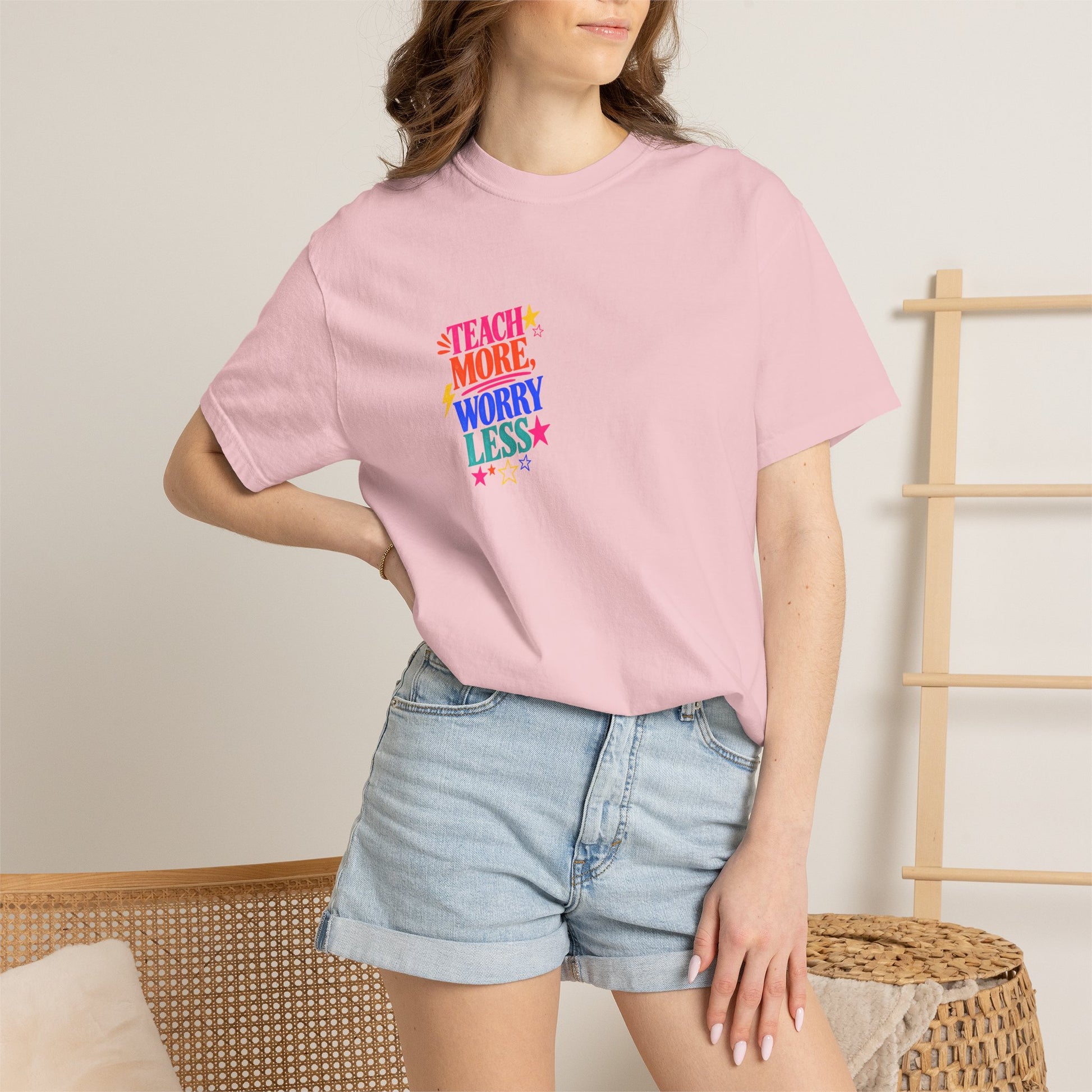 Teach More, Worry Less Tee in Blossom, worn by a model - a small left-chest print on a garment-dyed Comfort Colors 1717 tee.