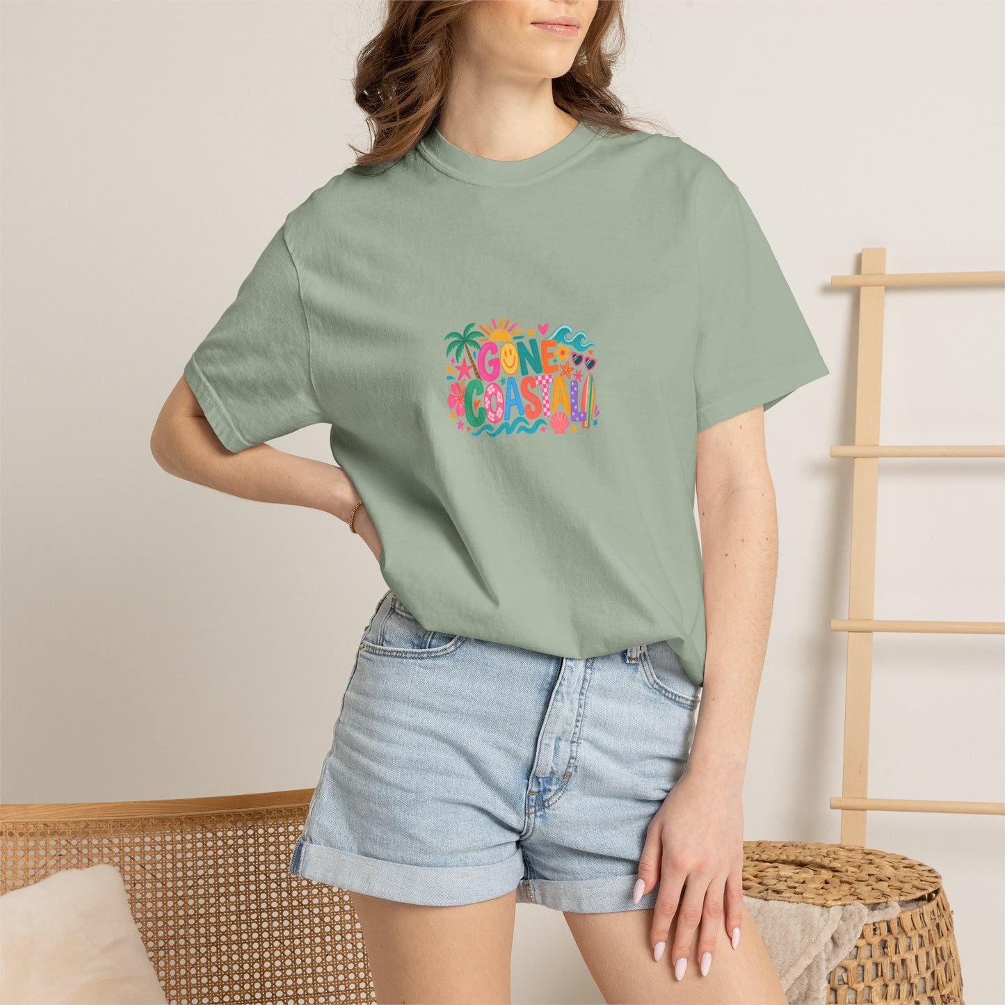 Gone Coastal Tee in Bay, worn by a model - a centred upper-front print on a garment-dyed Comfort Colors 1717 tee.