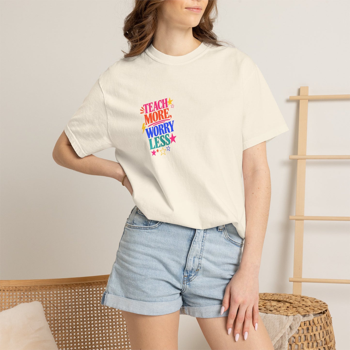 Teach More, Worry Less Tee in Ivory, worn by a model - a small left-chest print on a garment-dyed Comfort Colors 1717 tee.
