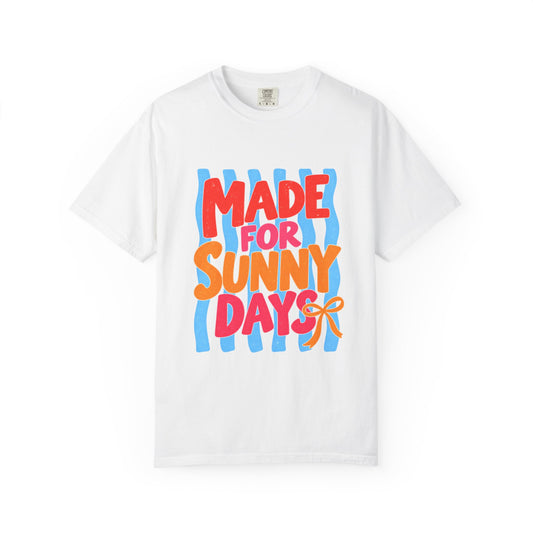 Made for Sunny Days Tee in White, front view - a large centered full-front print in chunky red and orange lettering over a wavy stripe backing, on a garment-dyed Comfort Colors 1717 tee.