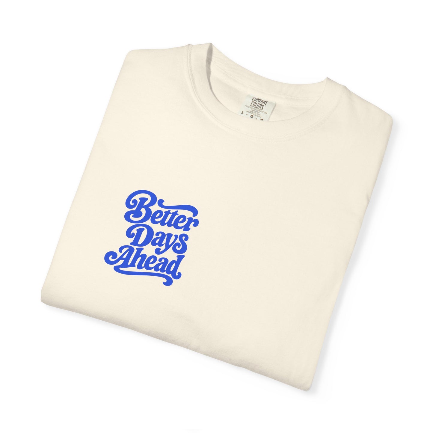 Better Days Ahead Tee in Ivory, folded flat - a small left-chest brush-script print on a garment-dyed Comfort Colors 1717 tee.