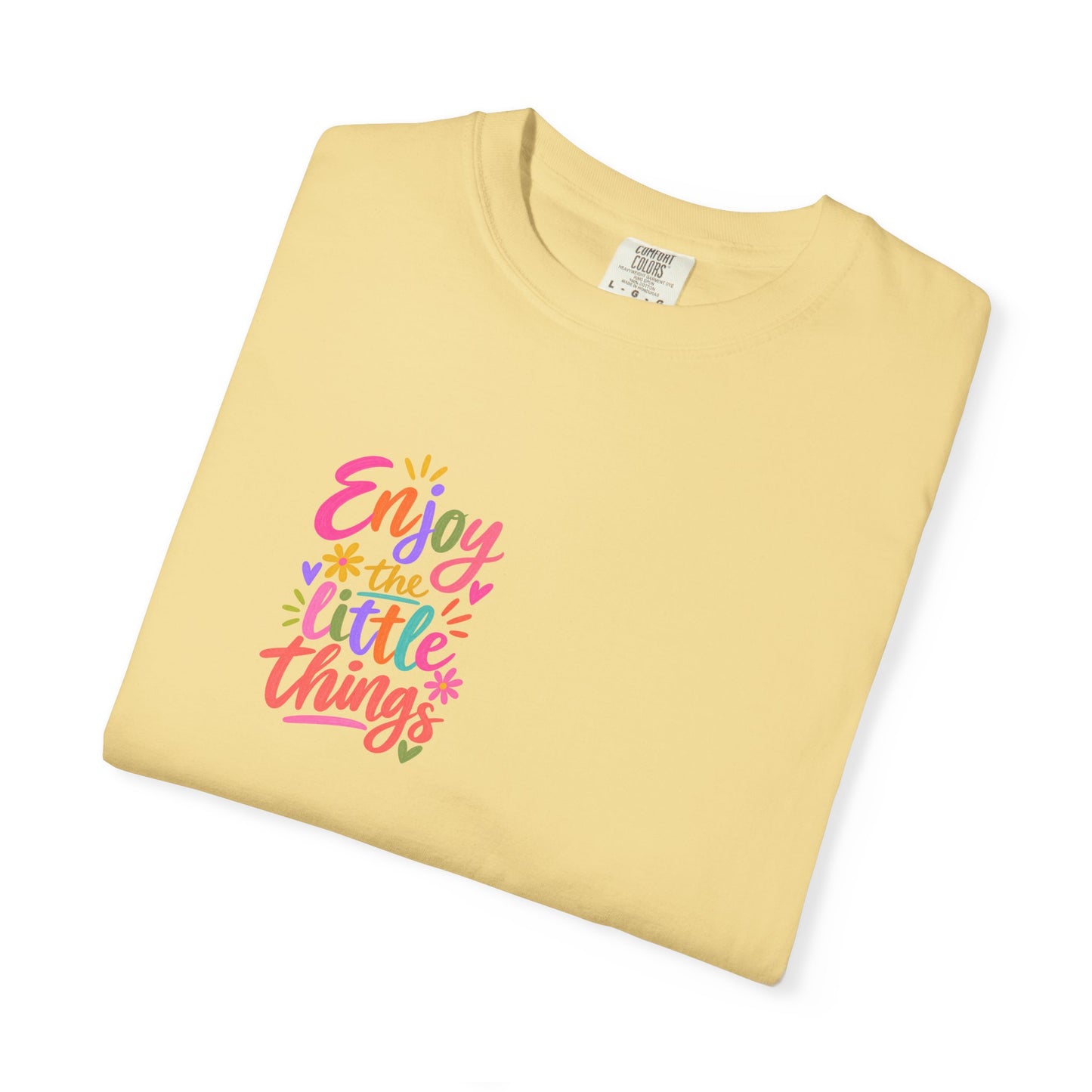Enjoy the Little Things Tee in Butter, folded flat - a small left-chest brush-script print on a garment-dyed Comfort Colors 1717 tee.