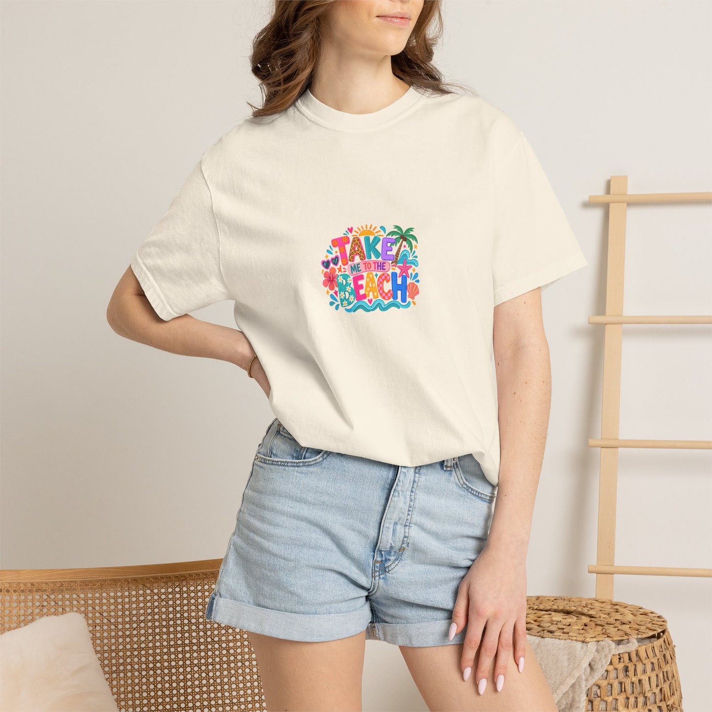 Take Me To The Beach Tee in Ivory, worn by a model - a centred upper-front print on a garment-dyed Comfort Colors 1717 tee.
