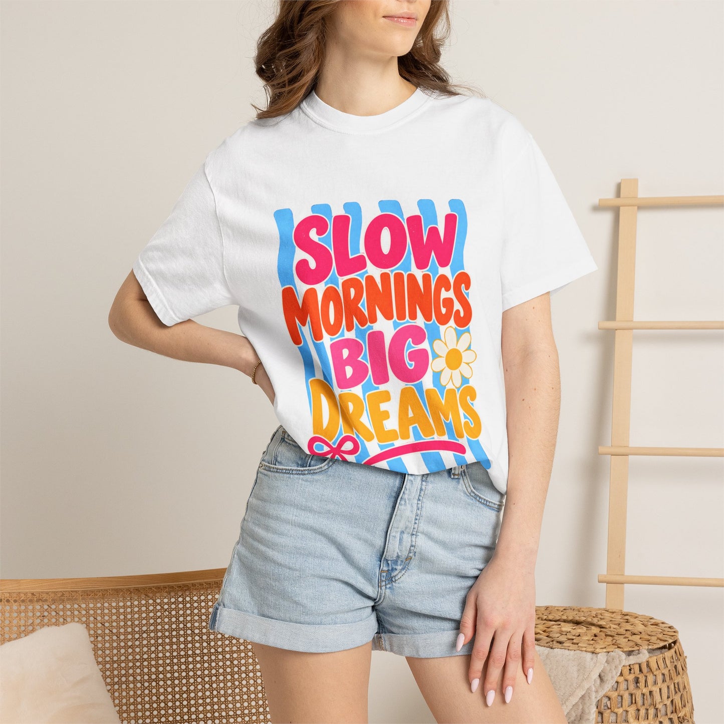Slow Mornings, Big Dreams Tee in Ivory, front view - a large centered full-front print in bold lettering over a wavy stripe backing, on a garment-dyed Comfort Colors 1717 tee.