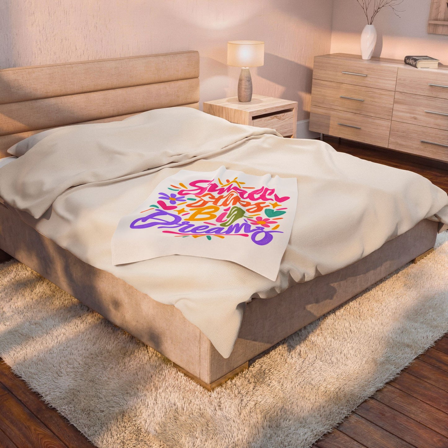 Small Steps, Big Dreams velveteen plush blanket with a bright hand-lettered print.