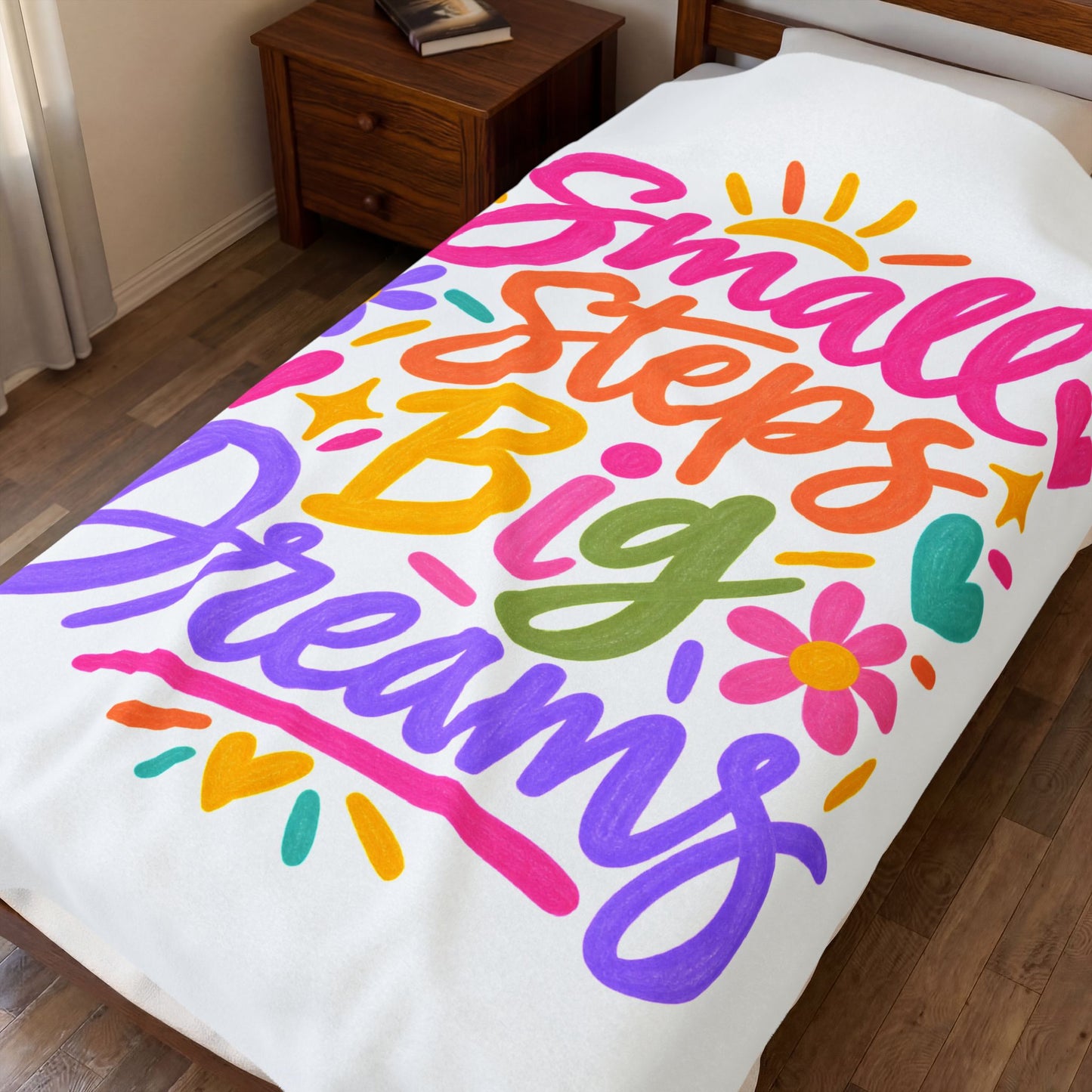 Small Steps, Big Dreams velveteen plush blanket with a bright hand-lettered print.