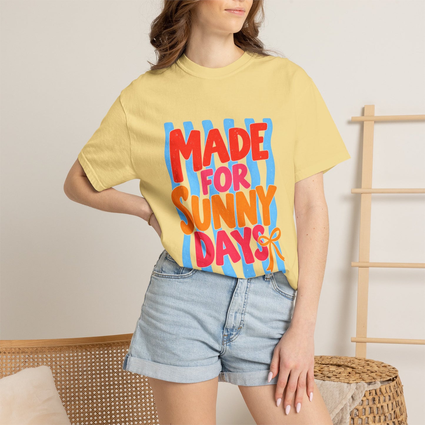 Made for Sunny Days Tee in Chalky Mint, front view - a large centered full-front print in chunky red and orange lettering over a wavy stripe backing, on a garment-dyed Comfort Colors 1717 tee.