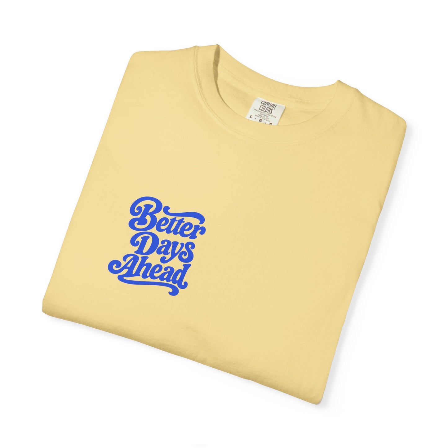 Better Days Ahead Tee in Butter, folded flat - a small left-chest brush-script print on a garment-dyed Comfort Colors 1717 tee.