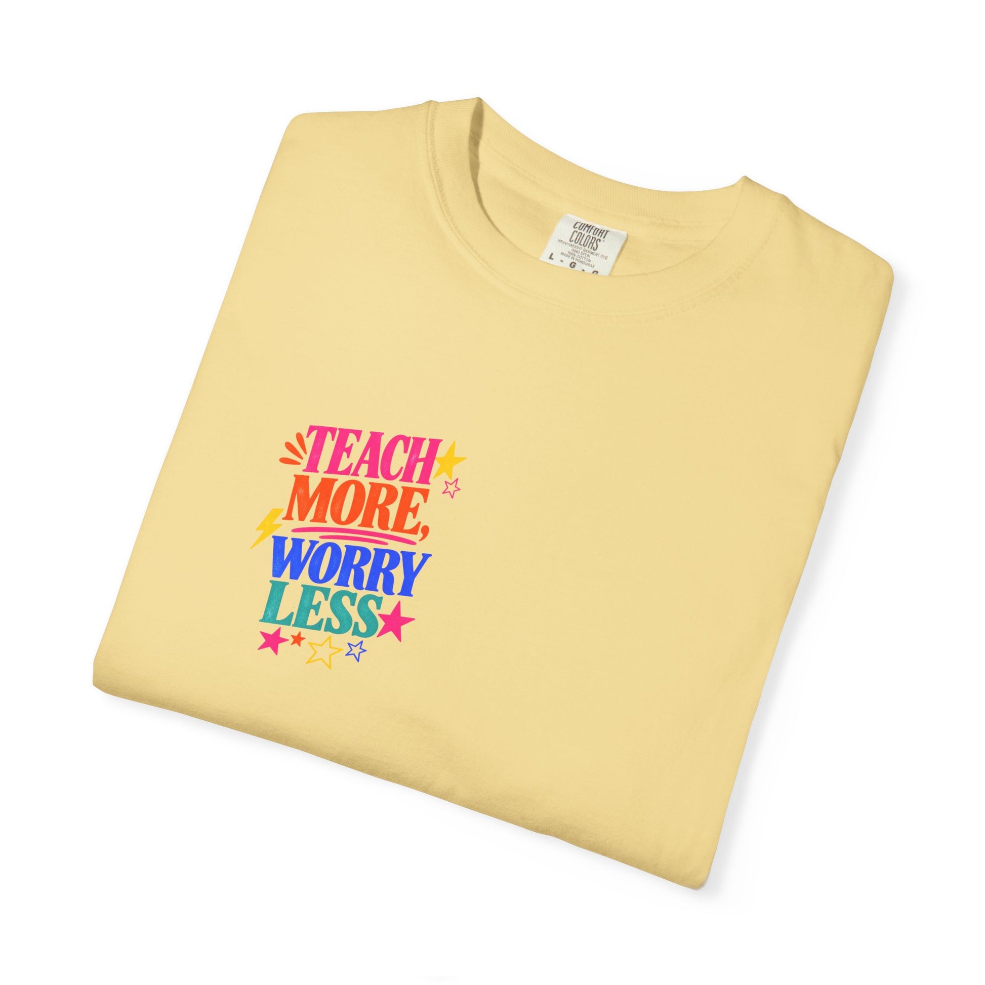Teach More, Worry Less Tee in Butter, folded flat - a small left-chest print on a garment-dyed Comfort Colors 1717 tee.