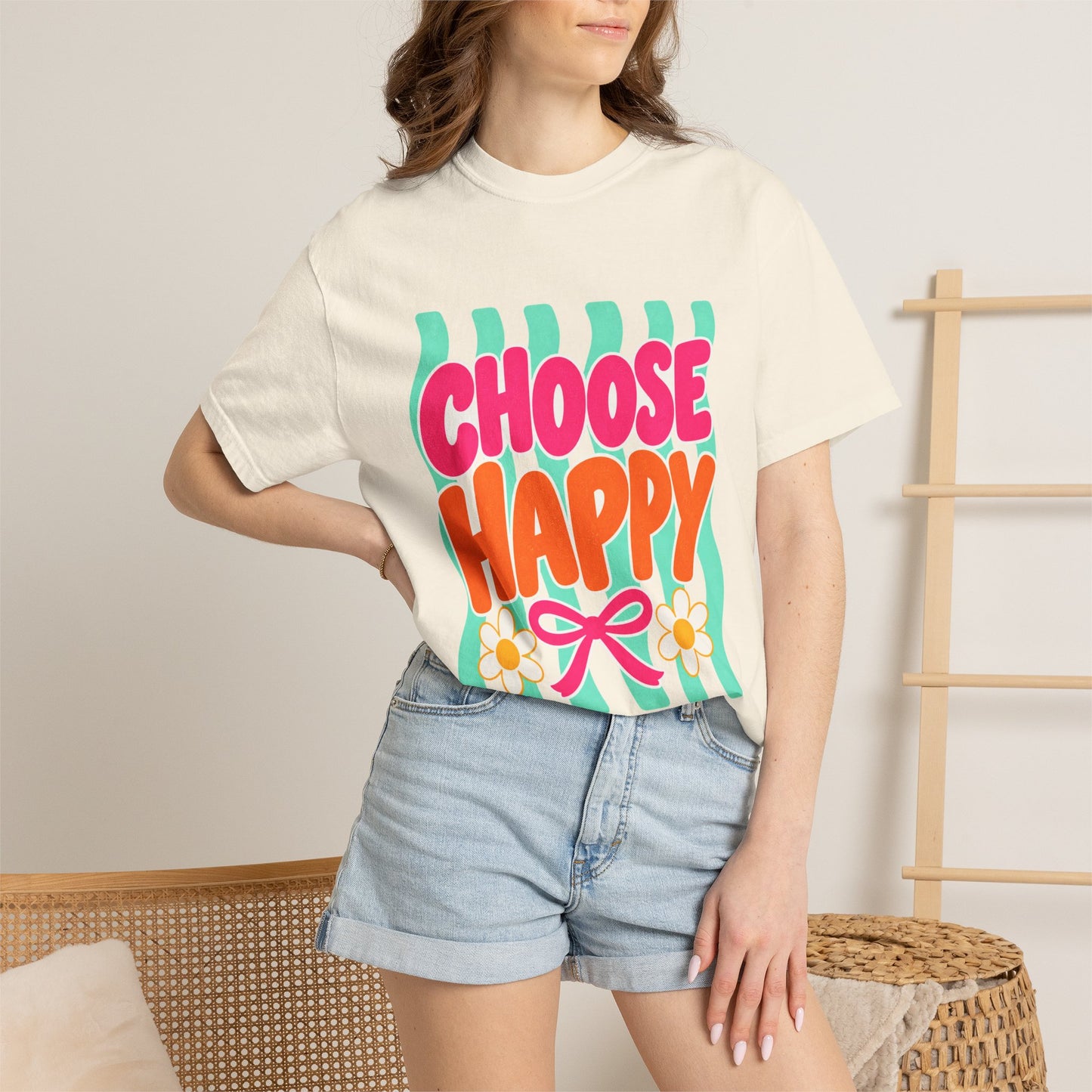 Choose Happy Tee in Butter, front view - a large centered full-front print in rounded pink and orange lettering with daisies, on a garment-dyed Comfort Colors 1717 tee.