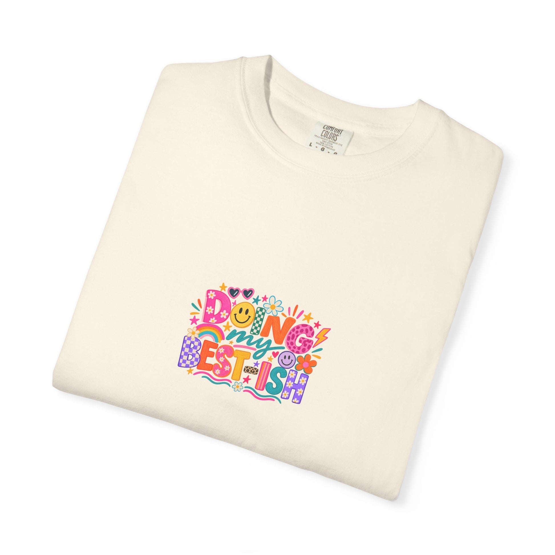 Doing My Best-ish Tee in Ivory, folded flat - a centred upper-front print on a garment-dyed Comfort Colors 1717 tee.