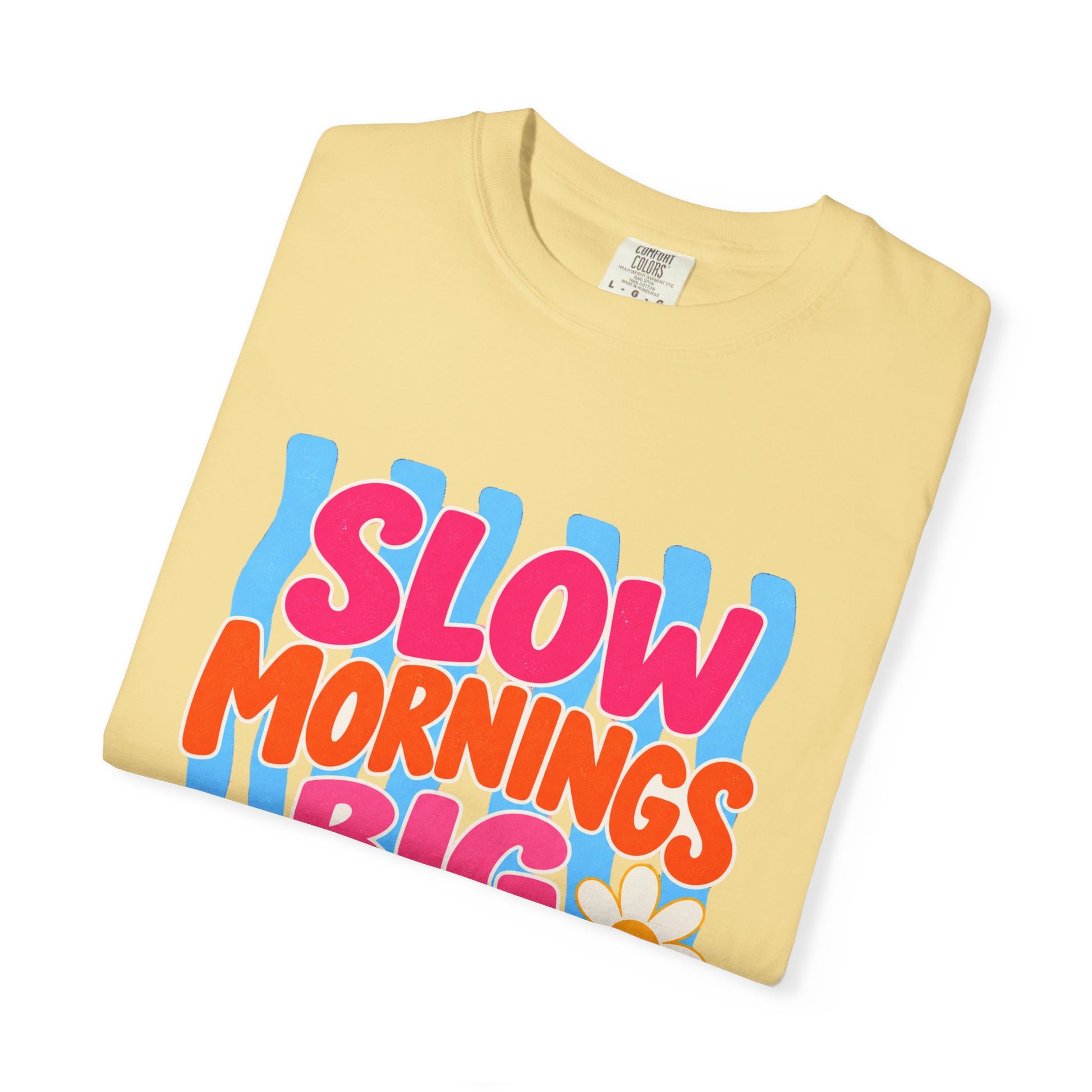 Slow Mornings, Big Dreams Tee in Butter, front view - a large centered full-front print in bold lettering over a wavy stripe backing, on a garment-dyed Comfort Colors 1717 tee.