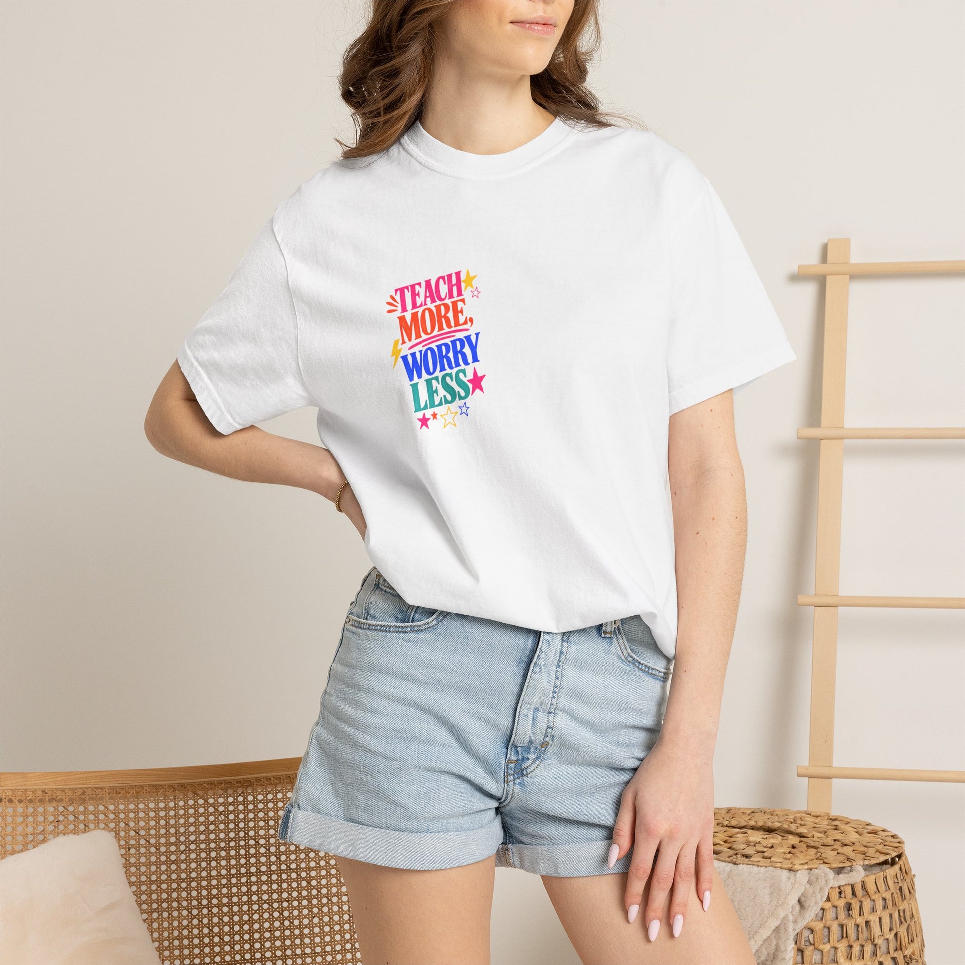 Teach More, Worry Less Tee in White, worn by a model - a small left-chest print on a garment-dyed Comfort Colors 1717 tee.