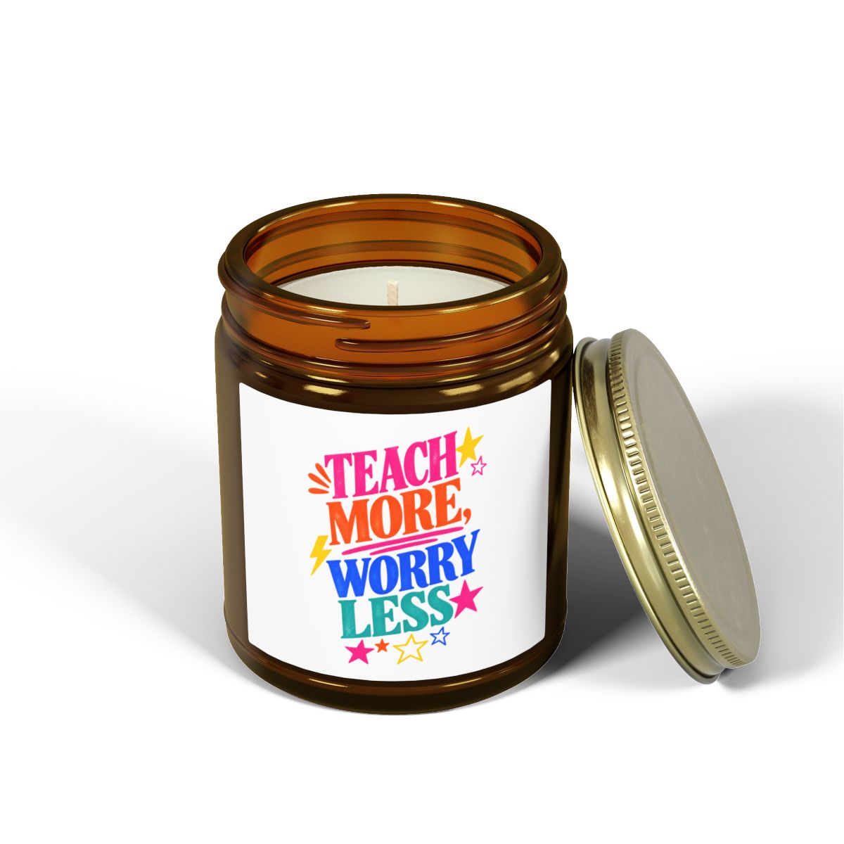 Teach More, Worry Less scented candle in an amber glass jar, front view