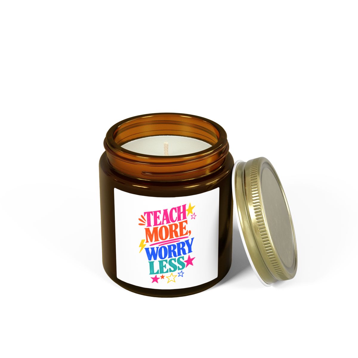 Teach More, Worry Less scented candle in an amber glass jar, shown open